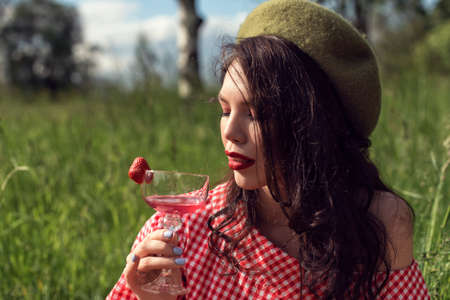 Walk with a girl in the summer garden