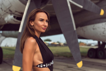 Brunette woman at the airfieldの写真素材