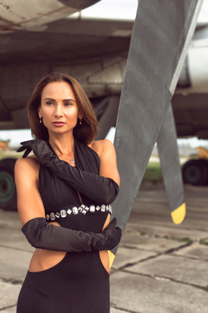 Brunette woman at the airfieldの写真素材