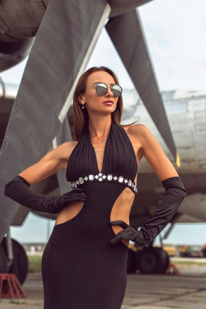 Brunette woman at the airfieldの写真素材