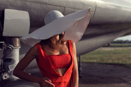 Brunette woman at the airfieldの写真素材