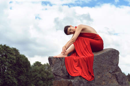 Girl with short hair in the parkの写真素材