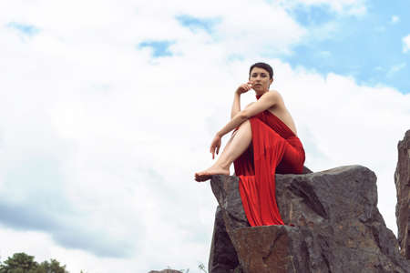 Girl with short hair in the parkの写真素材