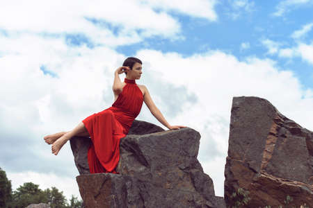 Girl with short hair in the parkの写真素材