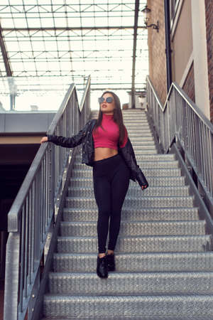 Walking with a girl in the city quarterの写真素材