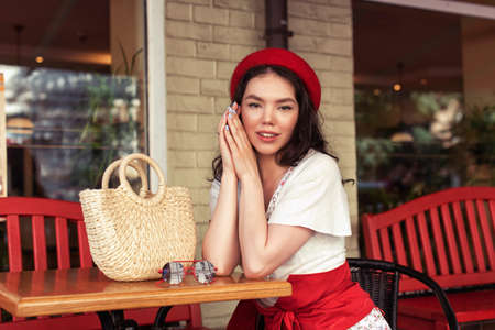 Summer photo session with a stylish brunetteの写真素材