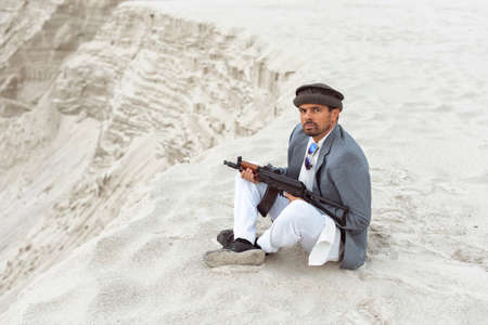 A man with a weapon in a military conflict