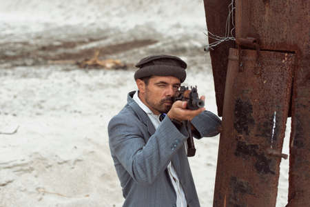 A man with a weapon in a military conflict