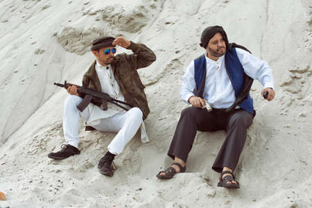 A man with a weapon in a military conflict