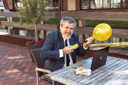 Businessman on the street and making money on bitcoinの写真素材