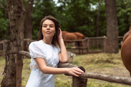 Walk with a horse near the riverの写真素材