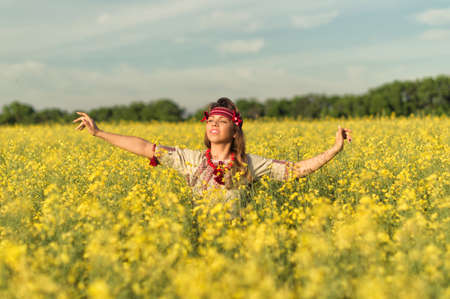 girl in spring blossoming field