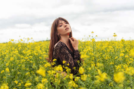 young woman in spring field