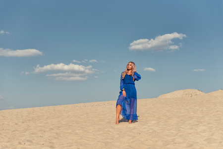 Summer walk on the sand dunesの写真素材
