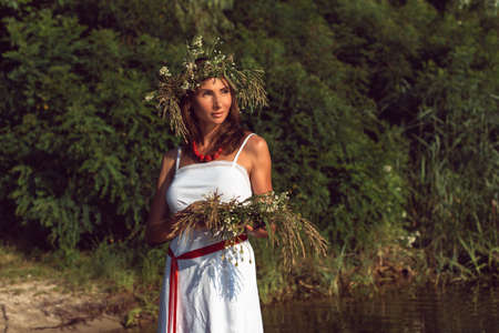 Young woman on the banks of the Dnieper riverの写真素材
