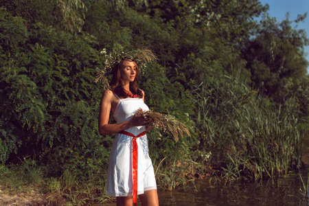 Young woman on the banks of the Dnieper riverの写真素材