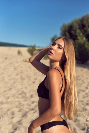 Blonde on a hot summer walkの写真素材