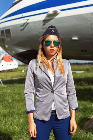 Young woman on the airfield