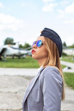 Young woman on the airfieldの写真素材