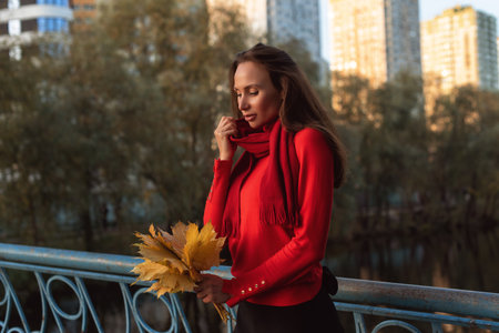 Young woman in the city garden