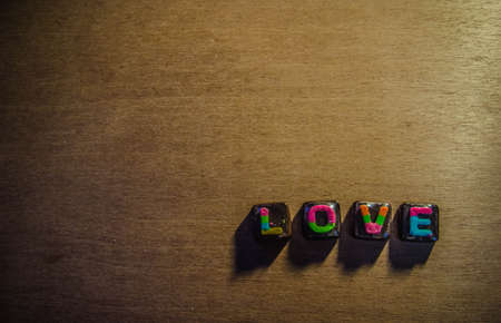A L-O-V-E Chocolate on a wood