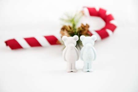 beautiful small plaster bear wishes Merry Christmas. White backgroundの写真素材