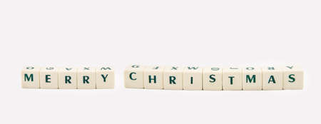 MERRY CHRISTMAS white cube text on white background.の写真素材