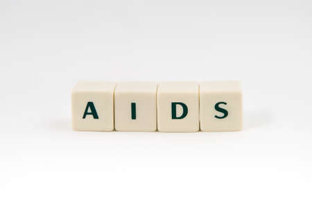 AIDS white cube text on white backgroundの写真素材