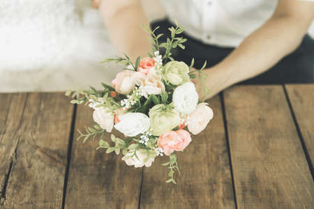 Beautiful wedding bouquet in handsの写真素材