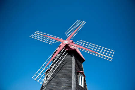 Windmill in Incheon, South Korea, with a blue sky backgroundの写真素材