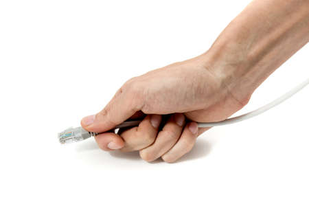 Ready-made LAN cable on IT professional handの写真素材