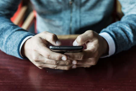 Man using a smartphoneの写真素材