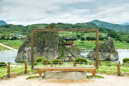 Chungcheongbuk-do, South Korea - August 29, 2016: Dodamsambong are three stone peaks rising out of the Namhangang River, South Koreaのeditorial素材