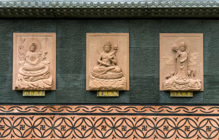Chungcheongbuk-do, South Korea - August 29, 2016: Buddha carved on the wall, South Koreaのeditorial素材