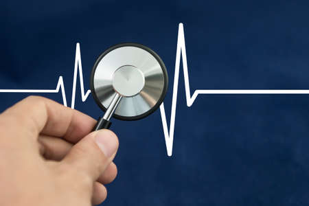 Stethoscope on the ECG. medical symbol