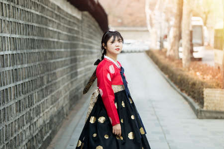 Beautiful Korean girl in Hanbok at Gyeongbokgung, the traditional Korean dress.の写真素材