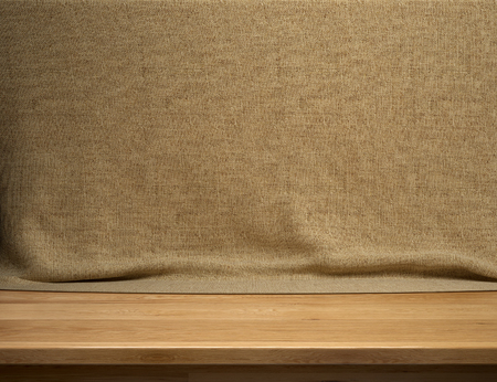 Wood table with brown sackclothの写真素材
