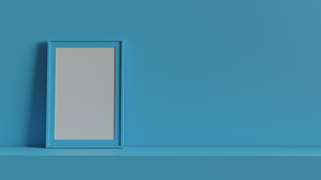 Blank picture frame with table and wall background. 3D rendering.の写真素材