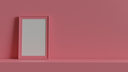 Blank picture frame with table and wall background. 3D rendering.の写真素材