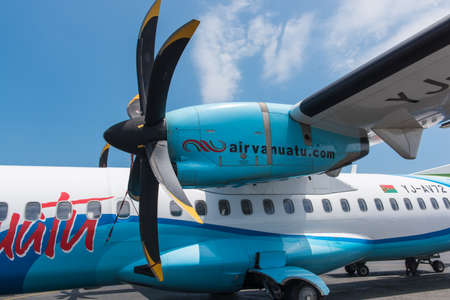 Portvila, Vanuatu - September 27, 2016:  Closeup of Air Vanuatu ATR 72-500 plane propeller and wing at Portvila airportのeditorial素材