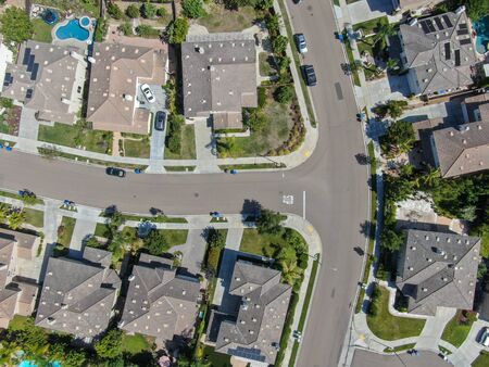 Aerial top view suburban neighborhood with big villas next to each other in San Diego, California, USA. Residential modern subdivision luxury house.の写真素材