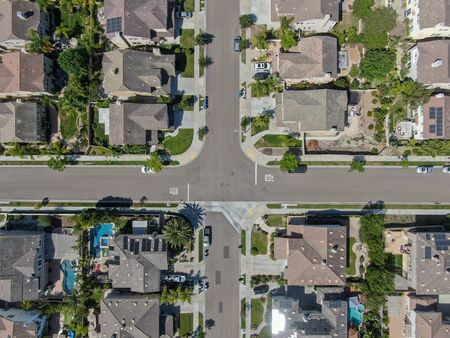 Aerial top view suburban neighborhood with big villas next to each other in San Diego, California,...
