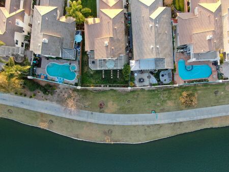 Aerial top view of Menifee Lake and neighborhood, residential subdivision vila during sunset. Riverside County, California, United Statesの写真素材
