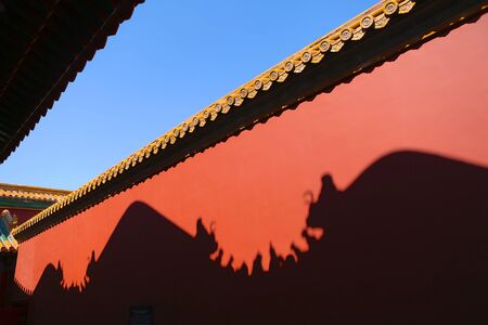 Red wall of the Forbidden City with shadow reflection, Beijing, Chinaのeditorial素材
