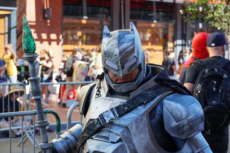 People wearing costumes, taking photos in the street next to the San Diego Comic-Con International, Comic book convention in San Diego, California, United States. July 23rd, 2019のeditorial素材