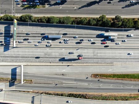 Aerial top view of highway with traffic in Diamond Bar City. Intersection city transport road with...