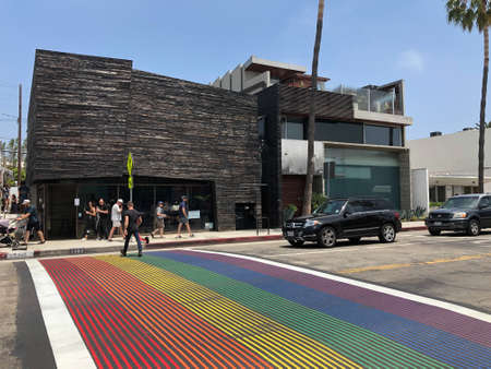 Rainbow gay flag crosswalk in Abbot Kinney Boulevard, Venice, Los Angeles, USA. Colorful pedestrian LGBT crosswalk. July 13th, 2019のeditorial素材