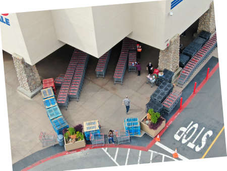Special lines for shoppers at Costco during COVID-19 pandemic. Coronavirus virus and panic buying...