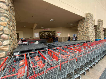 Special lines for shoppers at Costco during COVID-19 pandemic. Coronavirus virus and panic buying concept. San Diego, USA, March, 22nd, 2020のeditorial素材