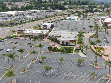 Aerial view of empty shopping center parking lot during COVID-19 pandemic.. Coronavirus virus and panic buying concept. San Diego, USA, March 22nd, 2020のeditorial素材